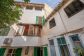 Gran casa de pueblo con patio interior y azotea cubierta en el corazón de Sóller